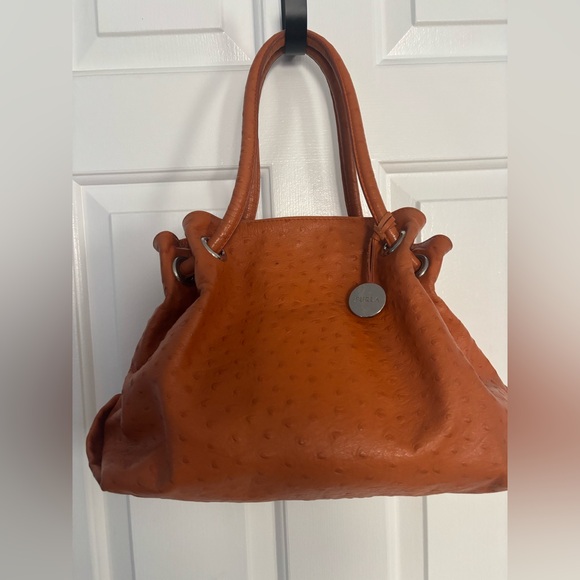 Furla Handbags - Furla Ostrich textured Orange Leather Shoulder Bag. Corners show wear.